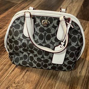 Purchased at outlet mall. Do not have long strap